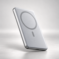 Titanium 5,000mAh ultra-slim magnetic power bank front, with magnetic charging ring on a light studio background