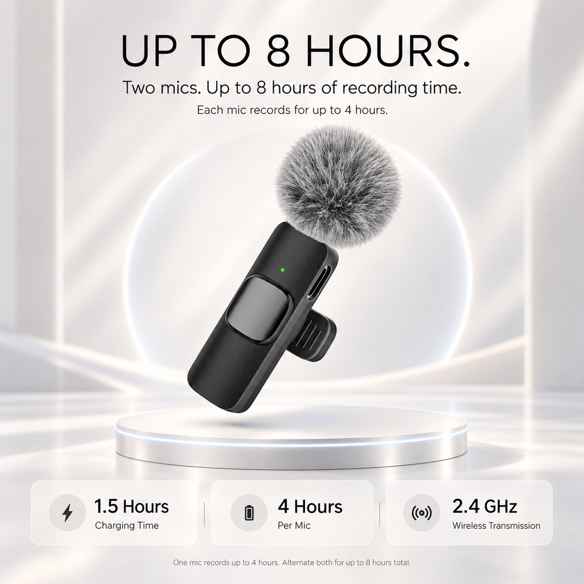 Black wireless lapel microphone with a gray furry windscreen, floating above a white circular pedestal. Text at the top reads 'UP TO 8 HOURS.