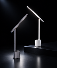 Two modern adjustable LED desk lamps with slim rectangular light bars and cylindrical bases, shown on a dark studio background with one lamp lit and one unlit.